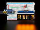 Quad Alphanumeric Display - Yellow 0.54\" Digits w/ I2C Backpack